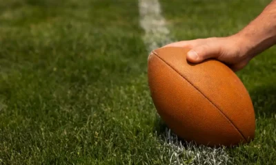 mano balon campo futbol americano