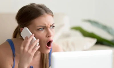 mujer discute con llamada spam