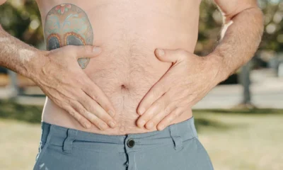 Imagen sobre porque me suena tanto la barriga, mostrando un abdomen o estómago con molestias digestivas.