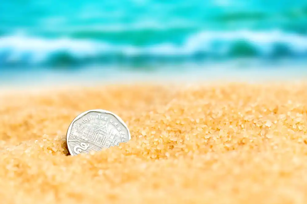 una moneda en la orilla