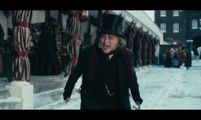 Johnny Depp como Scrooge