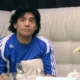 Maradona sentado en 2010