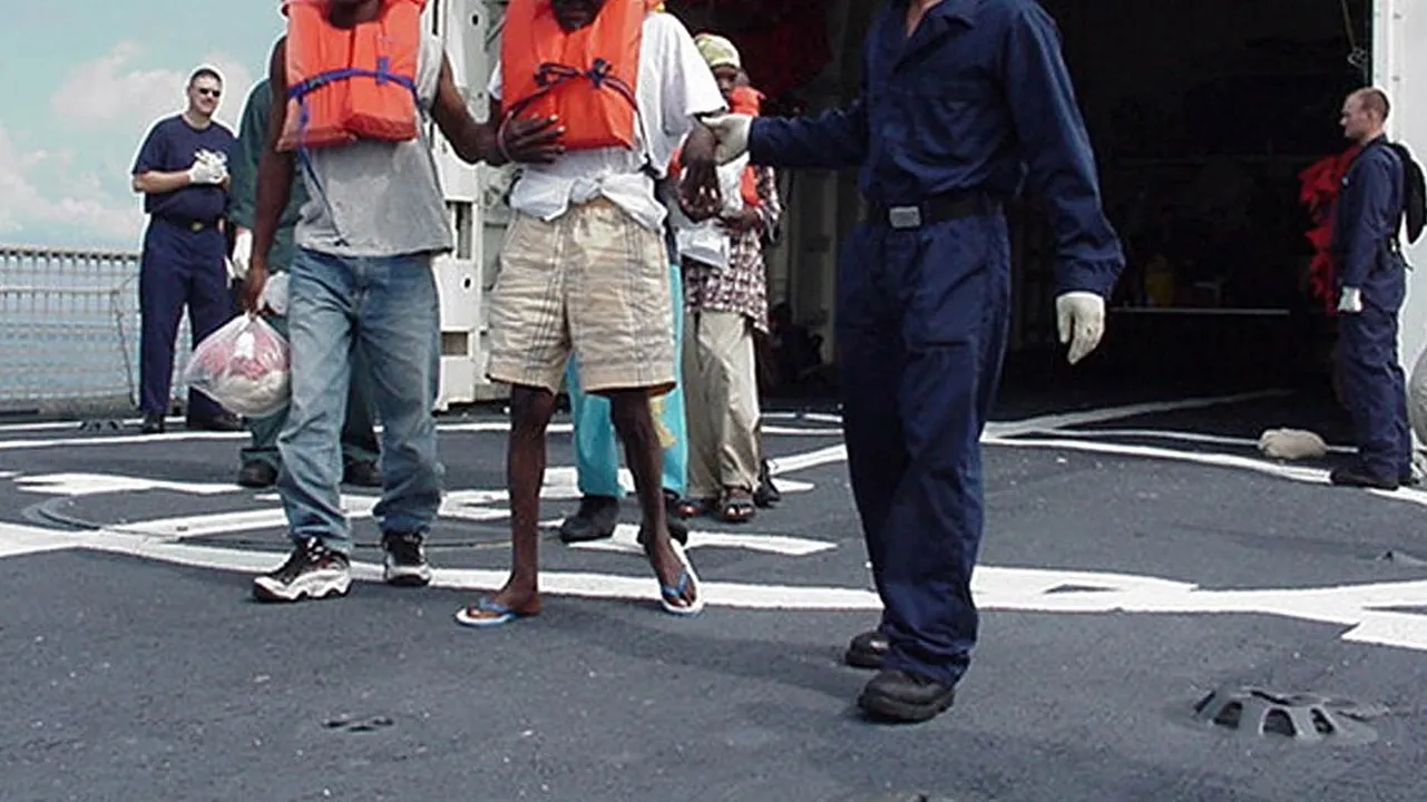 la repatriación de dos migrantes