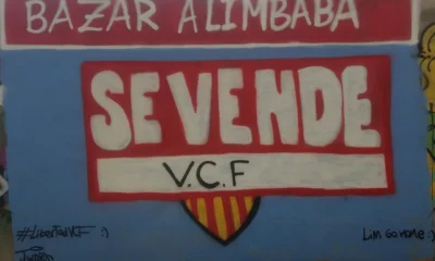 una pancarta contra peter lim