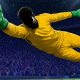 Portero en estirada espectacular deteniendo un balón en un estadio nocturno: los mejores porteros de EA Sports FC 27