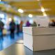 Urna electoral en un centro de votación — listas electorales del 29-N